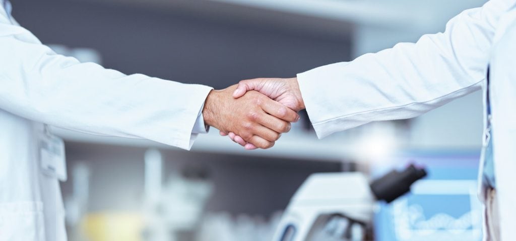 Hand shake, partnership and lab scientist, people or team work, collaboration and cooperation on me